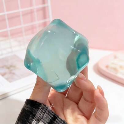 A Creative Ice-Brick-Shaped Squishy, A Handmade DIY Stress-Relief Toy. Its Surface Is As Thin As Paper, With A Smooth Texture And A Soft, Malleable Feel. It's Both A Squeezable Ice-Brick-Shaped Toy And A Stress-Relief Tool With An Incredibly Satisfying Texture That You Won't Be Able To Put Down. It's Perfect As A Desk Ornament Or As An Ideal Gift For Relieving Office Stress.