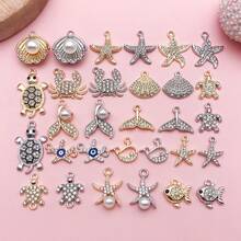 30个混合款式海洋主题水钻吊坠，包括海星、海龟壳等，适用于手链、耳环等工艺品。 - 均碼 - 查看 11