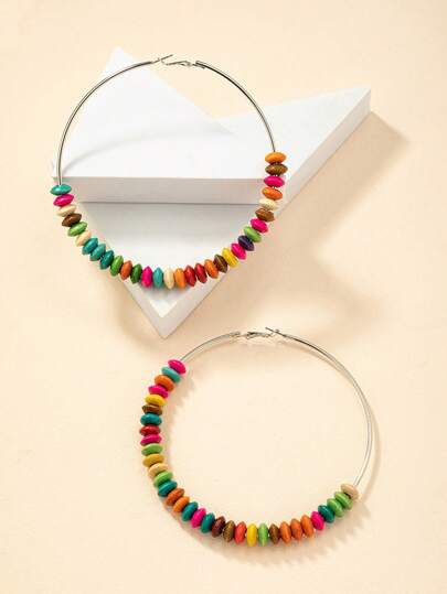 A Pair Of Bohemian Colorful Abacus Bead Large Hoop Earrings Lights Up The Summer Atmosphere, An Essential For Vacation-Style Outfits.