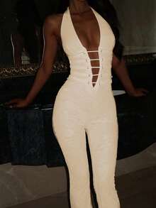 Bộ jumpsuit ren gợi cảm cổ chữ V sâu hở lưng dây mảnh, kiểu dáng Y2K dành cho nữ, chất liệu da PU ôm sát, trang trí ren, ống rộng buộc dây, thích hợp cho nhiều dịp #Tiệc tùng #Kiểu hở lưng #Lễ hội âm nhạc #Diện mạo dự tiệc #Hẹn hò #Mùa cưới #Tiệc Giáng sinh #Trở lại trường học #Kỳ nghỉ. Lưu ý: Vui lòng mặc đồ lót màu da. - Màu be - Xem 6