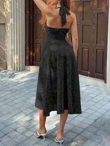 Abito midi estivo Unadoll in jacquard floreale, con scollo all'americana, profondo scollo a V sulla schiena, laccio, fluido, elegante, da invitata a matrimonio e per feste - nero - Visualizzare 3
