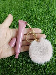 可爱毛绒球唇彩管钥匙扣 - 塑料唇油容器，带柔软挤压口和盖子，可爱的毛绒球装饰，可随身携带唇彩、唇油、润唇膏 - 可作为装饰钱包、背包、耳机包、行李箱和汽车配件钥匙扣，适合返校、夏季、斋月、情人节、圣诞节或感恩节（空唇彩管，可重复填充。） - 彩色 - 查看 4