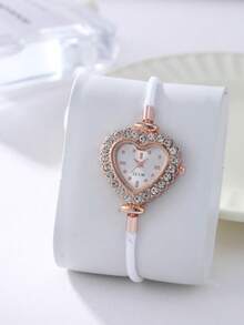 一套优雅的石英手表和珠宝配饰套装，包括一款时尚的圆形女士腕表和一条镶钻手链。 - 彩色 - 查看 14