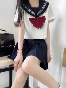 一套可爱风JK学生制服套装，含领带，藏蓝色百褶裙，白色短袖衬衫，红色领带，适合派对、角色扮演、COSPLAY、俱乐部活动、毕业典礼、约会、情人节等场合。 - 彩色 - 查看 8
