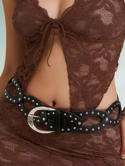 1件街头风乡村黑色西部牛仔做旧复古椭圆形镂空铆钉黑色圆形镂空拼接腰带，适合日常穿着