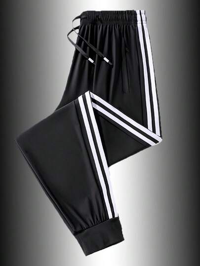 1 pièce Pantalon de survêtement noir à triple bande pour hommes - Tissu doux et confortable, taille élastique + cordon de serrage, poches latérales, style essentiel de sport casual