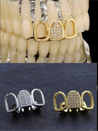 1个金色三齿嘻哈风牙套，镂空侧边设计，镶嵌闪亮锆石，男女通用，适合作为万圣节派对牙齿饰品或送给女性的礼物。