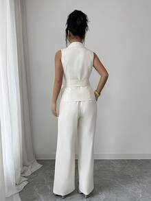 Conjunto de traje casual de mujer con top de chaleco con diseño de solapa superpuesta y retorcida, bajo asimétrico, y pantalones de pierna ancha, adecuado para el uso diario en primavera - crema - Ver 7