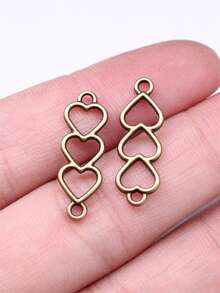 25 piezas Conectores metálicos con forma de corazón hueco - Bronce - Ver 4