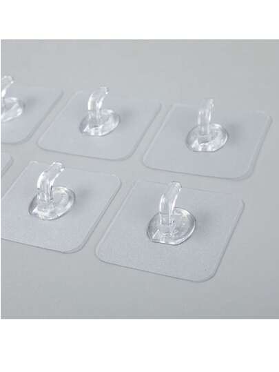 10/20/30/40/50个装强力粘性塑料牛角形墙钩，无需钻孔，透明无缝，防锈耐用，适用于浴室和厨房。安装时，请保持墙面干燥平整，并挤出挂钩内的空气。