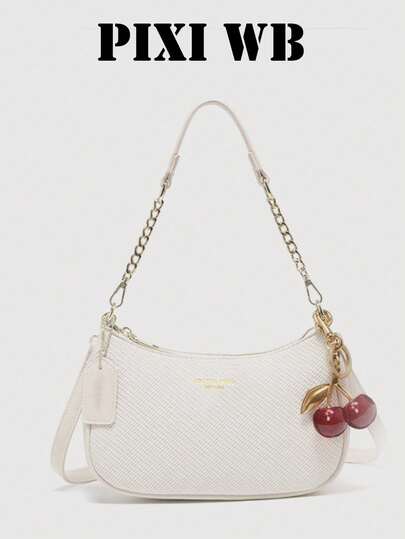 这款新颖时尚的经典多功能单肩包/月牙形包/腋下包采用纯色PU防水材质，饰以字母图案。它非常适合购物或斜挎。包身点缀着樱桃吊坠，使这款夏季月牙形包成为海滩度假、返校季的理想之选，也可作为女士钱包使用。