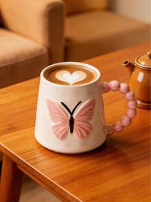 3D立体蝴蝶陶瓷咖啡杯、茶杯和茶壶套装，家用瓷杯，带圆珠笔手柄，适用于咖啡/茶，时尚设计，是送给女性、斋月、节日、聚会、居家或办公的理想礼物 - 彩色 - 查看 3