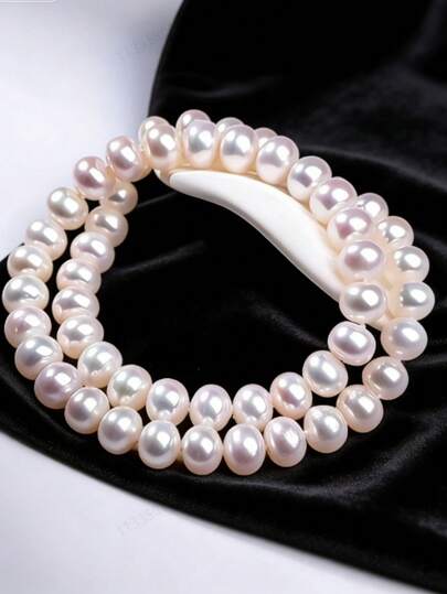 1 chiếc vòng cổ ngọc trai cao cấp dành cho nữ, ngọc trai nuôi cấy, thể hiện vẻ đẹp thanh lịch.