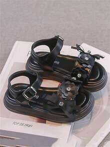 1 đôi dép xăng đan trẻ em màu đen, thiết kế dễ thương và thời trang, đế có đệm massage, mềm mại, chống trơn trượt, thích hợp cho bé tập đi, phù hợp cho mùa xuân, hè, thu và đông. - màu đen - Xem 2