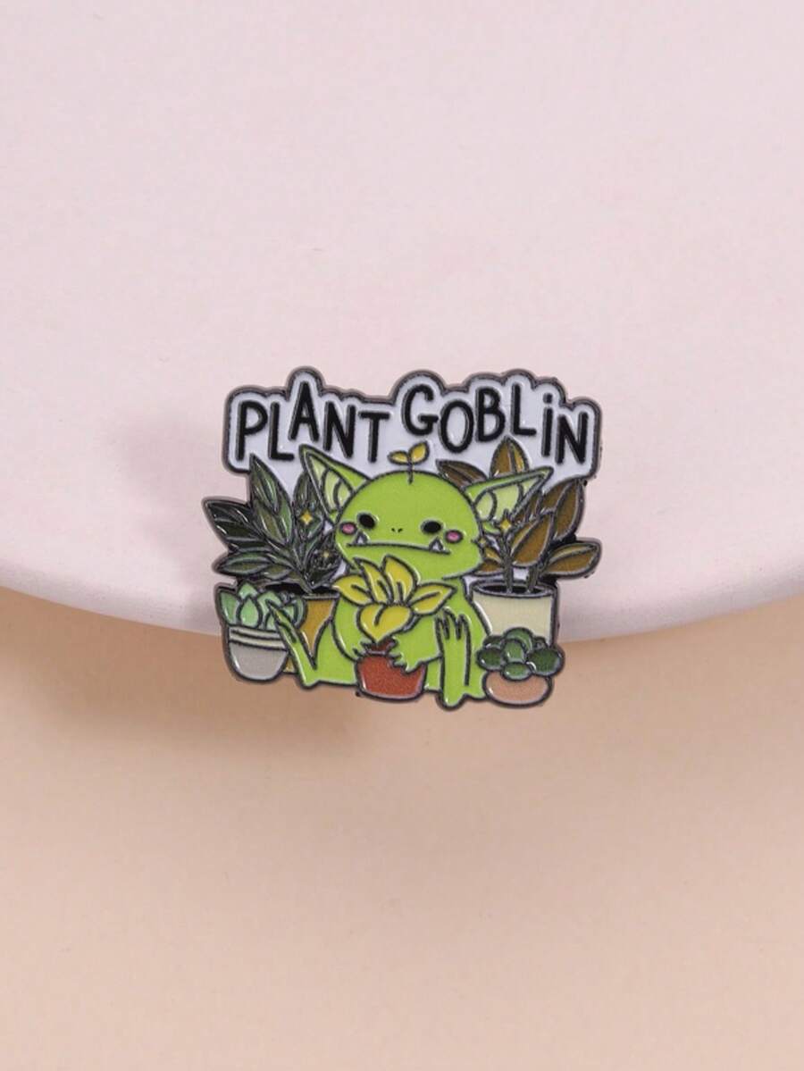 Enamel Gnome Badge, Fantasy Healing Design With Light Green Pointed Ears, Blush Cheeks, Gnome Holding Yellow Flower Surrounded By Turtle Back Bamboo Succulent Watering Can, Suitable For Fantasy Enthusiasts, Plant Parents, Farmhouse Style Lovers, And Healing Followers