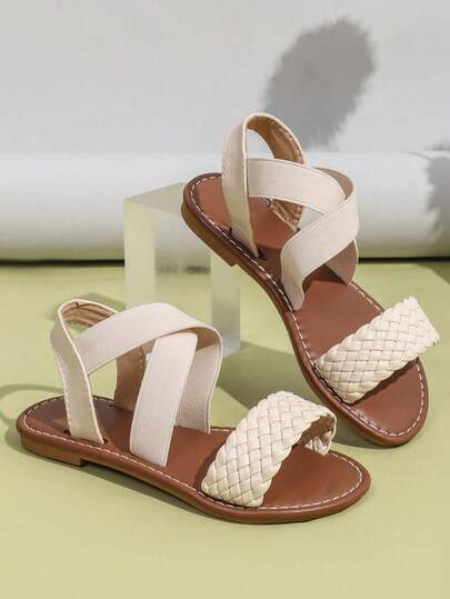 1双幼儿/小女孩米色加大码平底凉鞋，纯色PU编织带交叉后跟带圆头露趾时尚奢华可爱罗马凉鞋，适合3-15岁学生日常休闲旅行度假户外穿着，2026春夏新款