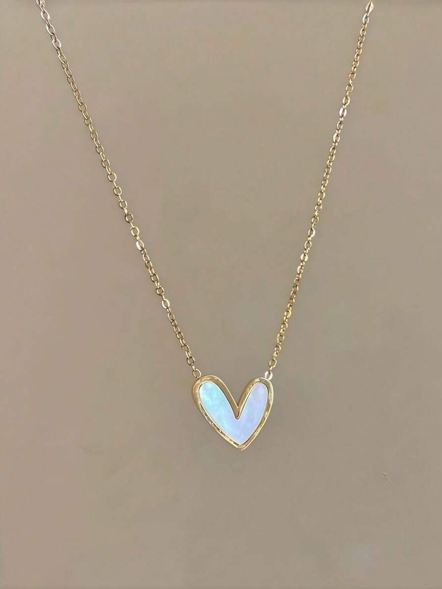 1 mặt dây chuyền hình trái tim vàng bất đối xứng, dây chuyền xương đòn tối giản tinh tế thời trang, thiết kế đa năng (Màu sắc của hình trái tim giọt dầu có thể thay đổi do góc chiếu sáng trong quá trình chụp)
