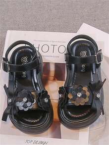 1 đôi dép xăng đan trẻ em màu đen, thiết kế dễ thương và thời trang, đế có đệm massage, mềm mại, chống trơn trượt, thích hợp cho bé tập đi, phù hợp cho mùa xuân, hè, thu và đông. - màu đen - Xem 3