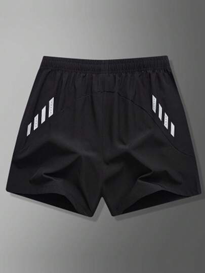 女士弹力腰跑步短裤，反光条纹细节，侧边开衩，适合锻炼和夜跑