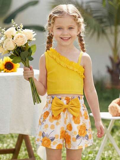 Conjunto de top de tirantes sin mangas con volantes y shorts con estampado de girasoles con lazo para niñas jóvenes
