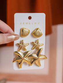 Bộ 6 khuyên tai thời trang hình nơ, trái tim, sao biển, vỏ sò, bộ khuyên tai sành điệu dành cho nữ, chất liệu CCB nhẹ. - Vàng - Xem 6