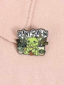 Enamel Gnome Badge, Fantasy Healing Design With Light Green Pointed Ears, Blush Cheeks, Gnome Holding Yellow Flower Surrounded By Turtle Back Bamboo Succulent Watering Can, Suitable For Fantasy Enthusiasts, Plant Parents, Farmhouse Style Lovers, And Healing Followers - Green - View 9