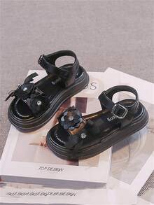 1 đôi dép xăng đan trẻ em màu đen, thiết kế dễ thương và thời trang, đế có đệm massage, mềm mại, chống trơn trượt, thích hợp cho bé tập đi, phù hợp cho mùa xuân, hè, thu và đông. - màu đen - Xem 4