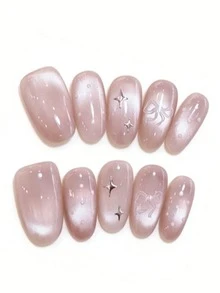 10pcs It's Named Pink Bow Star Glow. This Manicure Showcases A Seamless Blend Of Milky Pink And Shimmery Cat-Eye, Paired With Playful Star And Bow Details. The Soft, Glossy Finish And Whimsical Patterns Create A Chic, Versatile Look-Ideal For Date Nights, Weddings, Or Any Day You Want To Feel Extra Sweet And Charming - Baby Pink - View 1