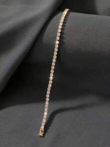 1 pièce Bracelet chaîne de tennis entièrement pavé de diamants dorés, disponible en plusieurs tailles. Accessoire polyvalent et délicat pour femmes avec des pierres de zircone densément montées qui brillent magnifiquement sous la lumière. Design minimaliste mais luxueux, convenant à diverses occasions - Or jaune - Voir 12