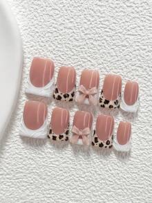 Bộ 10 móng giả polygel họa tiết da báo, bao gồm móng giả acrylic, nơ màu be, họa tiết da báo đen nâu, họa tiết gợn sóng trắng, kèm dụng cụ làm móng (1 miếng dán gel + 1 dũa móng). Có 3 hình dạng: hạnh nhân, mỏ vịt, hình quan tài. Thích hợp cho sử dụng hàng ngày, dự tiệc, chụp ảnh, đi làm vào mùa xuân/hè. Món quà tuyệt vời dành cho phụ nữ và các cô gái. - Nhiều màu - Xem 17