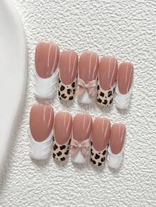 Bộ 10 móng giả polygel họa tiết da báo, bao gồm móng giả acrylic, nơ màu be, họa tiết da báo đen nâu, họa tiết gợn sóng trắng, kèm dụng cụ làm móng (1 miếng dán gel + 1 dũa móng). Có 3 hình dạng: hạnh nhân, mỏ vịt, hình quan tài. Thích hợp cho sử dụng hàng ngày, dự tiệc, chụp ảnh, đi làm vào mùa xuân/hè. Món quà tuyệt vời dành cho phụ nữ và các cô gái. - Nhiều màu - Xem 14