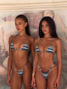 Bộ bikini kẻ sọc dành cho nữ. Thiết kế dây mảnh tôn lên đường viền cổ và vai, với họa tiết kẻ sọc cổ điển. Thích hợp cho kỳ nghỉ. - Màu xanh nhạt - Xem 9