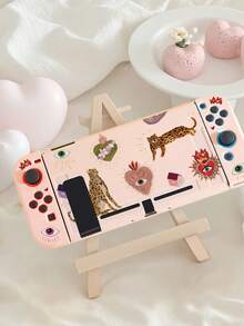 1个豹纹、眼睛、太阳图案的Switch保护壳，兼容Switch OLED屏幕和Switch主机，采用柔软的TPU材质，无需拆卸，防摔防尘，多种颜色可选，是送给Switch玩家的理想礼物，优雅清新的Switch保护壳。 - 查看 10