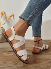 Sandalias planas de mujer de unicolor simple con tiras elásticas cruzadas, sandalias planas cómodas, versátiles, casuales y elegantes para exteriores y playa - Beis - Ver 5
