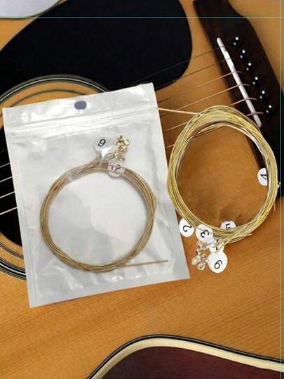 6件套古典吉他弦套装，适用于古典吉他、古典钢弦吉他、古典民谣吉他等。配件包括：吉他、吉他配件、吉他弦、吉他和弦、卡林巴琴、吉他放大器、吉他壁挂架、原声吉他（木质）、无弦吉他、吉他配件、充气吉他、吉他拨片、吉他用品、电吉他放大器。