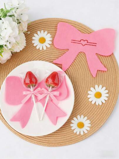 12件套粉色蝴蝶结糖果套，粉色蝴蝶结棒棒糖架，粉色蝴蝶结派对餐具包装装饰，婴儿派对餐具装饰，蝴蝶结生日派对餐桌装饰用品，性别揭晓派对装饰，一周岁生日派对用品，新娘送礼会周年纪念装饰，婚礼餐桌装饰，餐桌装饰，女孩生日派对装饰，婴儿派对用品，婴儿派对礼物