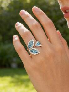 1枚奢华叶形设计蓝色立方氧化锆订婚戒指，高贵独特的开口戒指，适合女性商务、大学、度假、派对和日常佩戴。 - 湖藍 - 查看 5