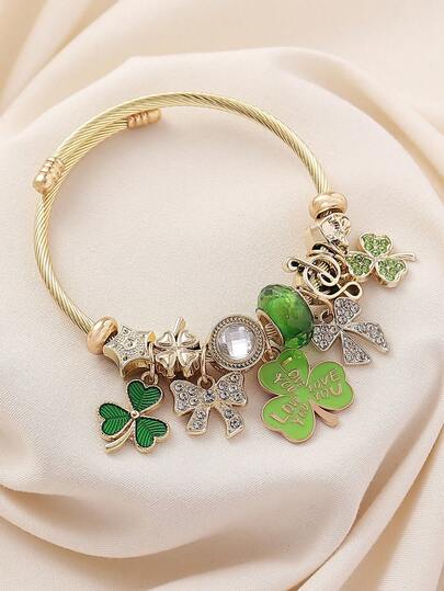 1件优雅水晶镶嵌油画LOVE字母、四叶草、蝴蝶吊坠不锈钢手链，搭配音乐符号串珠绿色手链，适合女性在节日、派对和日常场合佩戴。