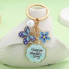 Llavero con colgante de flor de perla con gota de aceite y mariposa, regalo para el Día de la Madre - 1 artículo - Ver 1