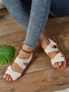 Sandalias planas de mujer de unicolor simple con tiras elásticas cruzadas, sandalias planas cómodas, versátiles, casuales y elegantes para exteriores y playa - Beis - Ver 6
