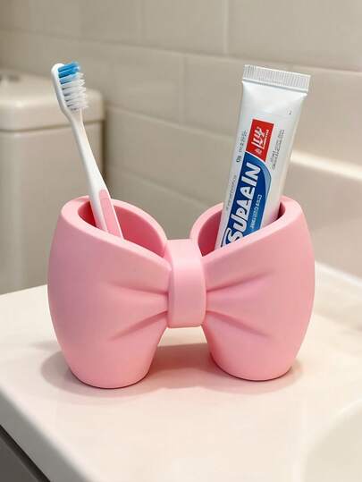 Giá đựng bàn chải đánh răng hình nơ, giá để bàn chải và kem đánh răng trang điểm, kệ đựng đồ, đế, giá đựng cọ trang điểm, làm bằng nhựa, có thể đặt độc lập, thích hợp trang trí phòng ngủ và phòng tắm.