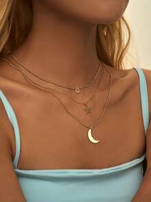三件套简约叠戴项链，包括铜质星星、月亮、圆形边框和锆石，适合女性日常佩戴和派对场合。 - 金黃色 - 查看 5