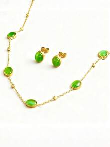 一套时尚绿色宝石吊坠不锈钢项链，搭配圆形宝石装饰耳环和优雅串珠锁骨项链，适合日常佩戴和节日礼物，也是送给闺蜜的理想之选。 - 金色 - 查看 5