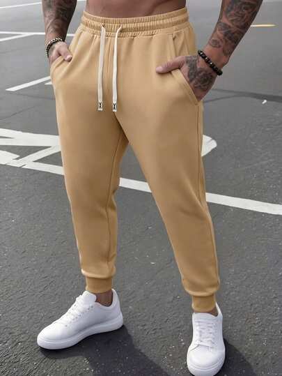 新款男士运动跑步裤，纯色抽绳休闲运动裤，适合春夏健身跑步穿着，日常穿着也合适。