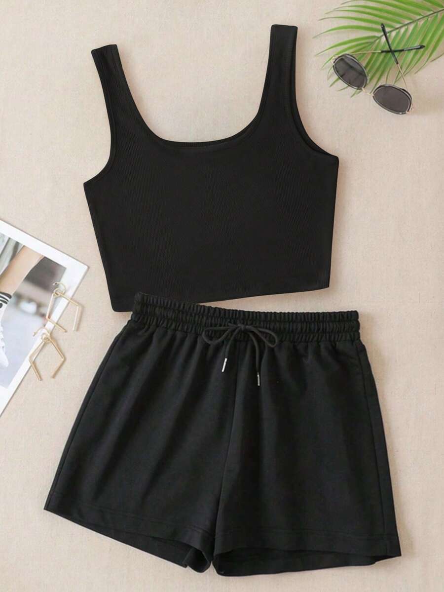 Conjunto de 2 piezas para mujer. Un conjunto de ropa deportiva de 2 piezas que incluye un top corto acanalado y shorts deportivos, adecuado para actividades al aire libre, deportes, viajes, caminatas por la ciudad, etc. Cómodo y fácil de combinar. Top acanalado elástico, conjunto de top corto y shorts para mujer, conjunto de 2 piezas para mujer. Top para mujer, shorts para mujer, conjunto de ropa deportiva para mujer. Negro - Negro - Ver 1