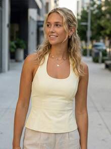 Camisetas sin mangas con cuello halter para mujer, ajustadas, lisas, sin mangas, con volantes en el dobladillo, espalda cruzada, chaleco con lazo, ropa de calle elegante de verano - amarillo claro - Ver 3