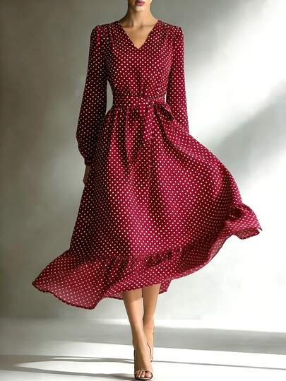Vestido midi elegante de mujer con cuello en V, manga larga, volantes en el bajo y cintura ceñida con lunares rojos