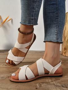 Sandalias planas de mujer de unicolor simple con tiras elásticas cruzadas, sandalias planas cómodas, versátiles, casuales y elegantes para exteriores y playa - Beis - Ver 4