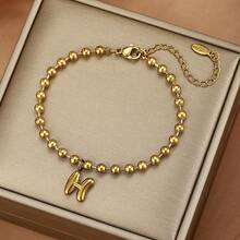 26 piezas Pulsera con dijes de letras iniciales, pulsera de acero inoxidable con cuentas doradas con letras de burbuja, adecuada para uso diario de mujeres, la caja de regalo es solo para fines de fotografía - Dorado - View 22