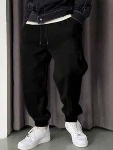 Pantalones deportivos casuales básicos negros para hombre, cintura y puños elásticos, ligeros y cómodos para uso diario - Negro - Ver 10